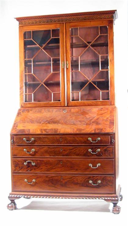 Appraisal: Chippendale-style two-part secretary The upper section with molded cornice over