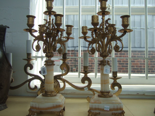 Appraisal: A pair of five branch gilt brass and alabaster candelabra