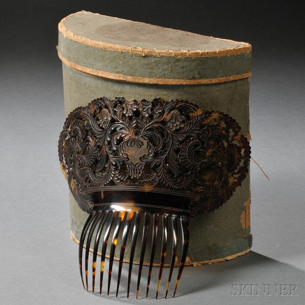 Appraisal: Pierced and Relief-carved Ornamental Lady's Tortoiseshell Comb in Original Box