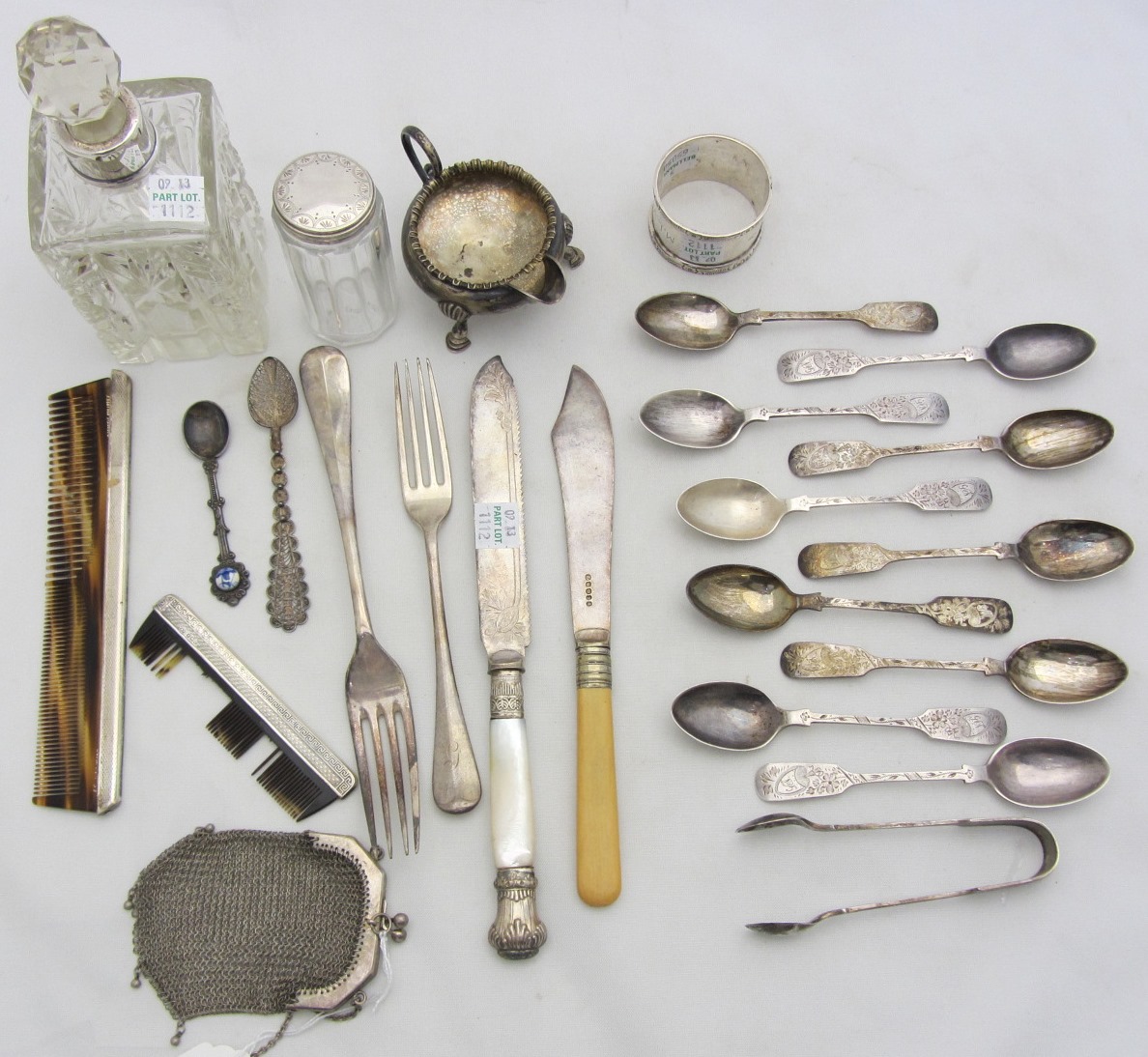 Appraisal: Ten silver fiddle pattern teaspoons and a matching pair of