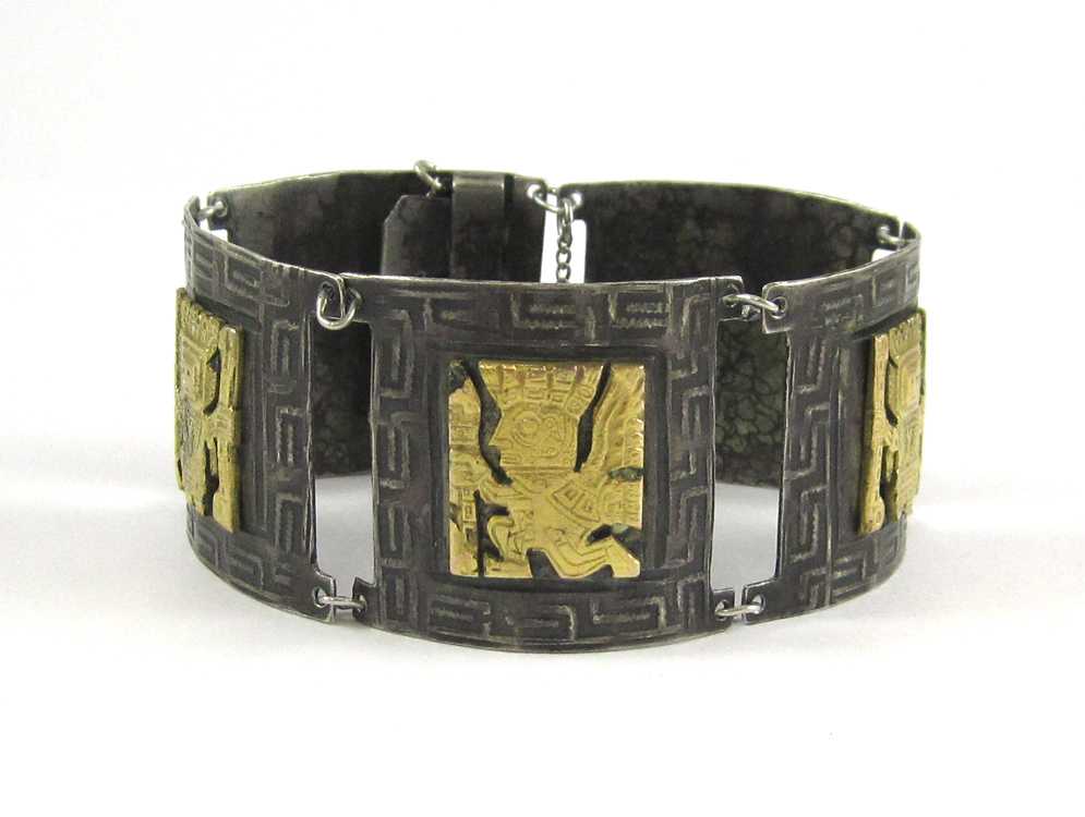 Appraisal: SILVER AND YELLOW GOLD TRIBAL BRACELET measuring inches in length