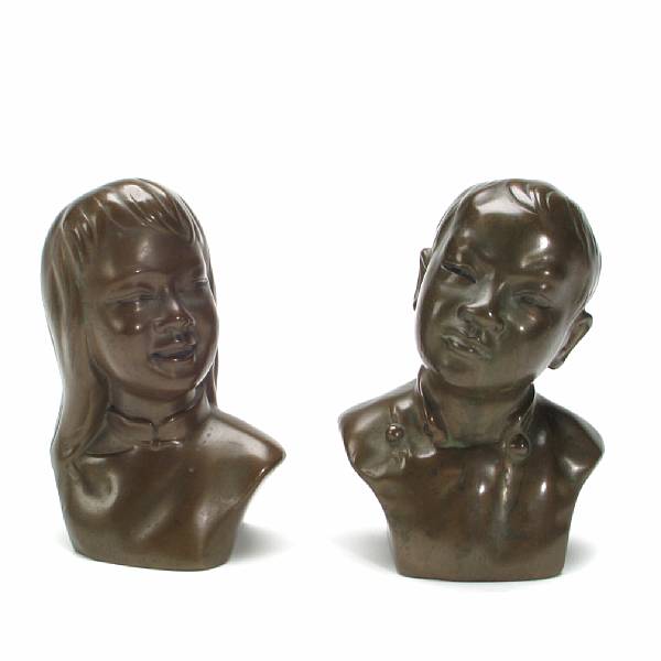 Appraisal: A pair of patinated-bronze busts first quarter th century depicting