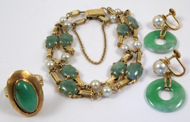 Appraisal: FOUR ARTICLES OF JADE JEWELRY including a jade pearl and