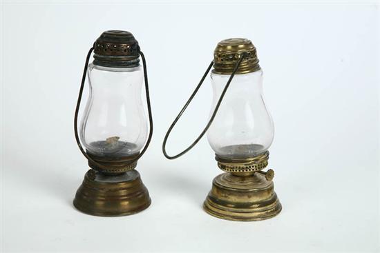 Appraisal: TWO SKATER'S LANTERN Both brass with wire handles and clear