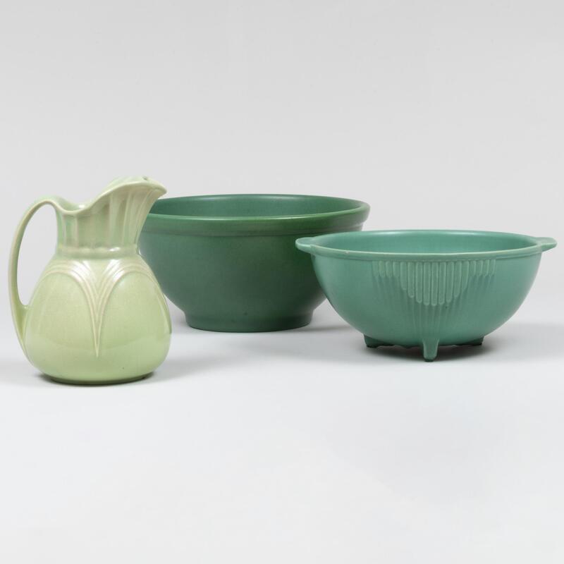 Appraisal: Two Green Glazed Nesting Bowls and a Pitcher The footed