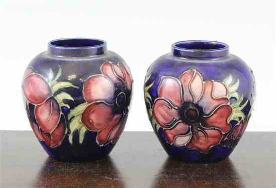 Appraisal: A pair of Moorcroft Anemone pattern small ovoid vases post-war