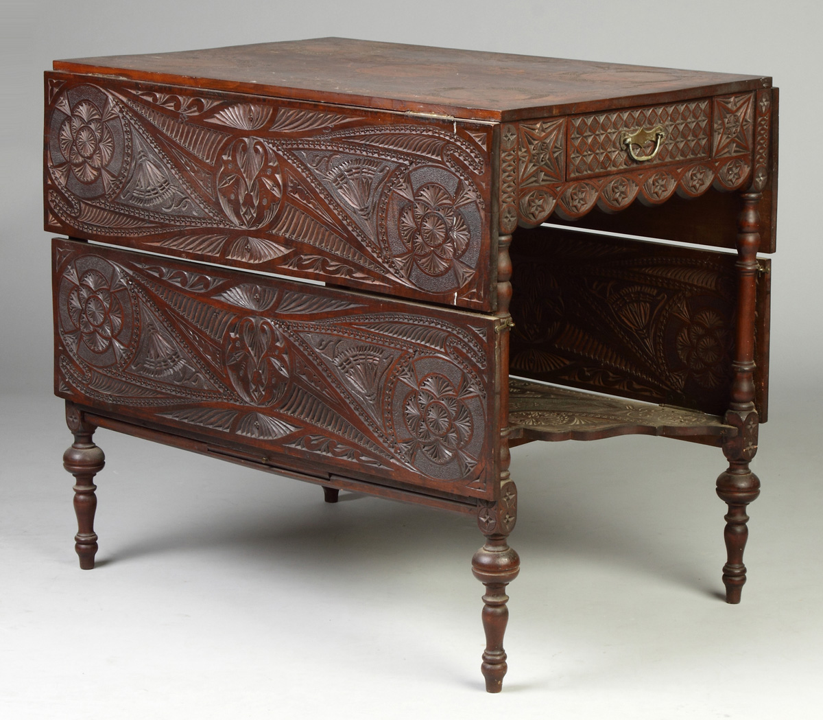 Appraisal: Whimsically Carved Drop Leaf Table w Drawers C