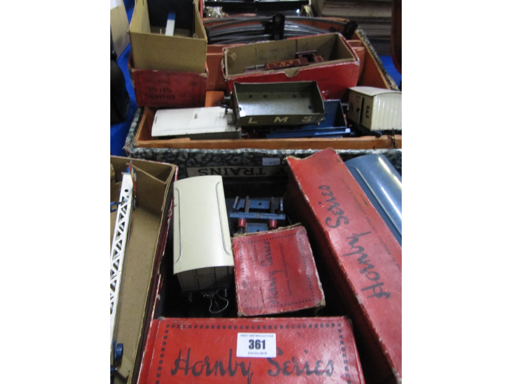 Appraisal: A Hornby tinplate train set with accessories on two trays