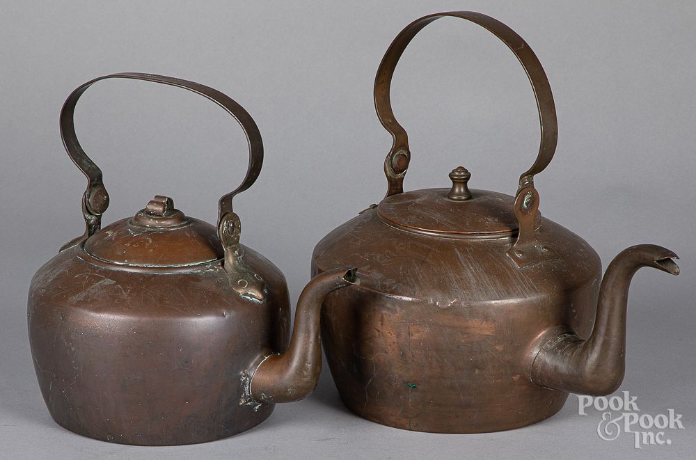 Appraisal: Two American copper kettles th c Two American copper kettles