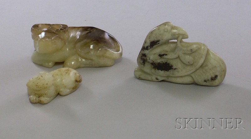 Appraisal: Three Carved Jade Figures a seated bird a seated bull