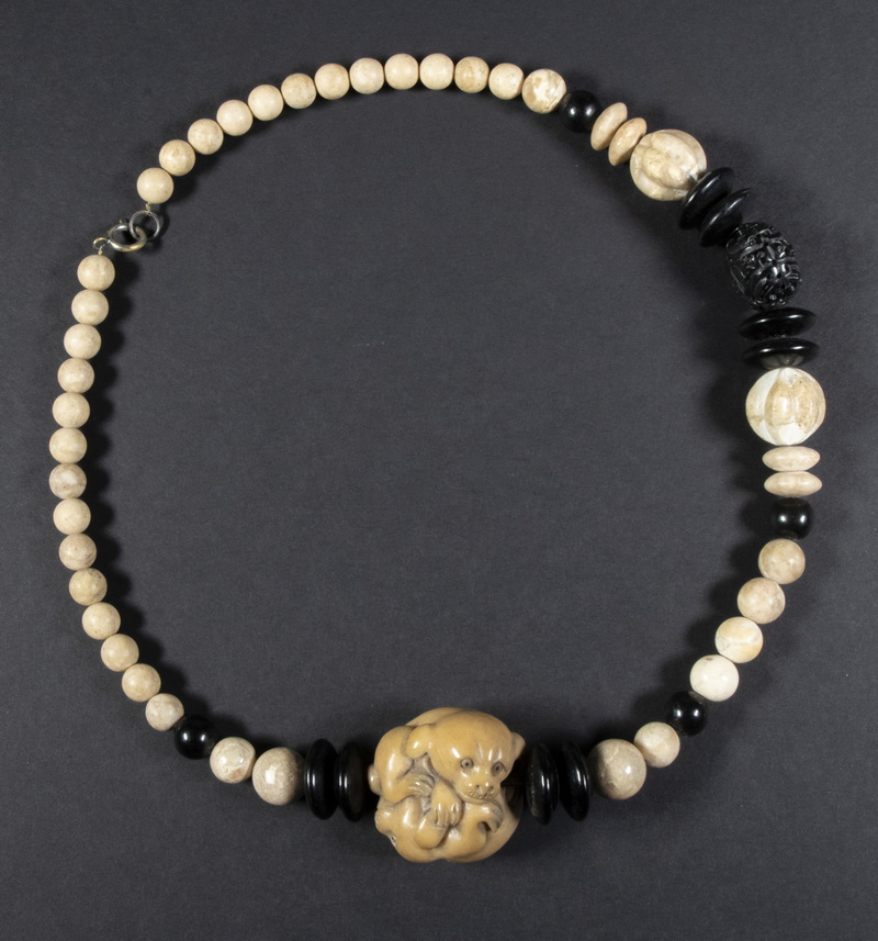 Appraisal: JAPANESE OJIME BEAD NECKLACE WITH NETSUKE Meiji Period Carved Bead