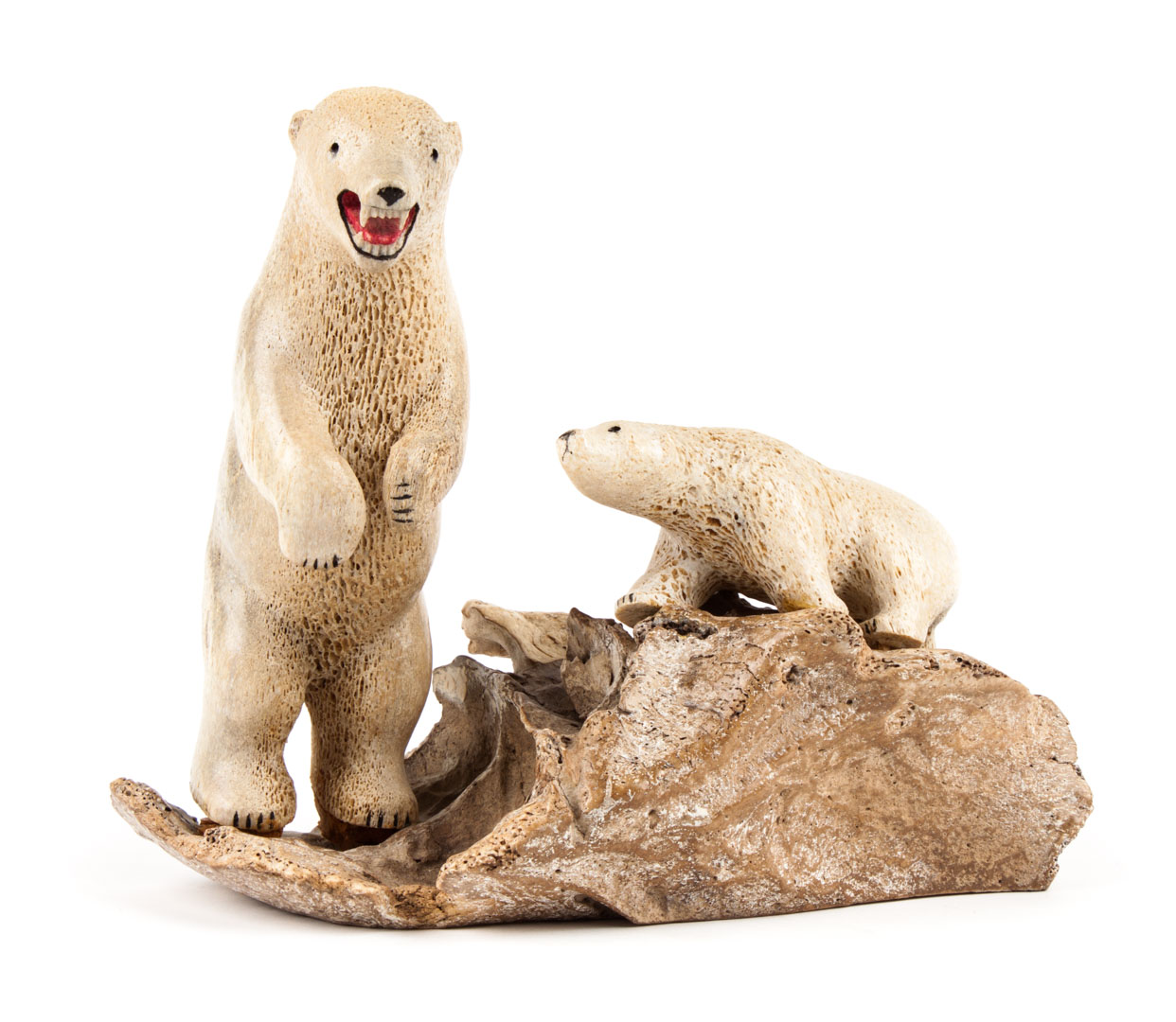 Appraisal: Inuit carved bone polar bear group modeled as carved bone