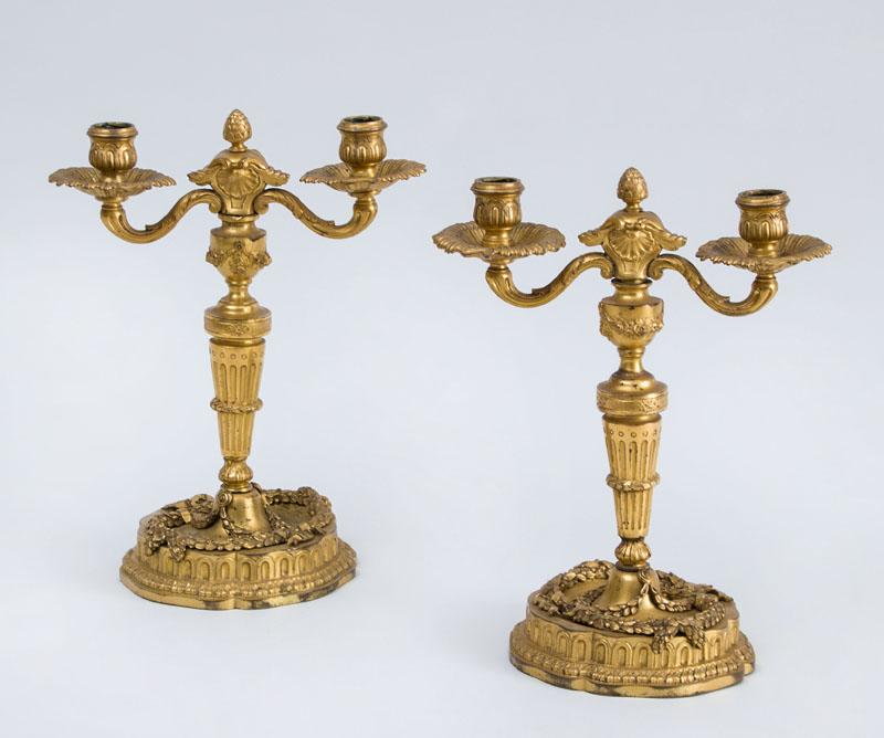 Appraisal: PAIR OF LOUIS XVI STYLE GILT-BRONZE TWO-LIGHT CANDELABRA Each tapered