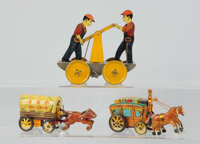 Appraisal: Lot Of Tin Litho Toys Two of them are made