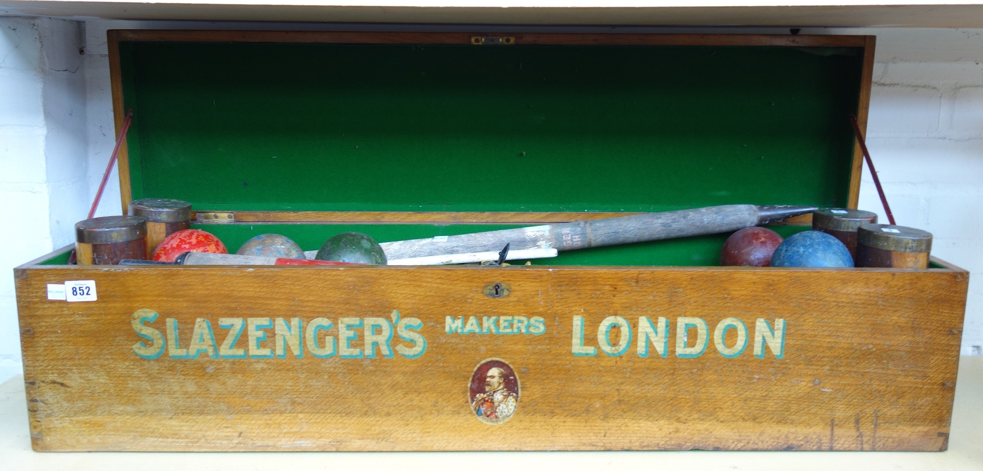 Appraisal: A Slazengers croquet set circa comprising four mallets coloured balls