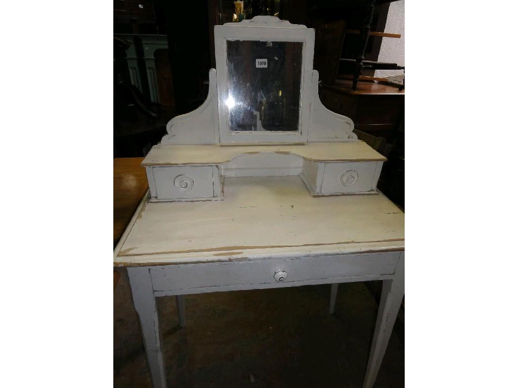 Appraisal: A small painted dressing table the raised back with swing