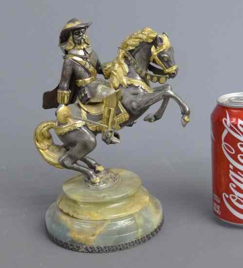 Appraisal: Mixed metals sculpture man on horseback Labeled Italy on base