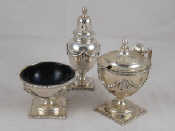 Appraisal: A silver Adam style three piece cruet with swags on