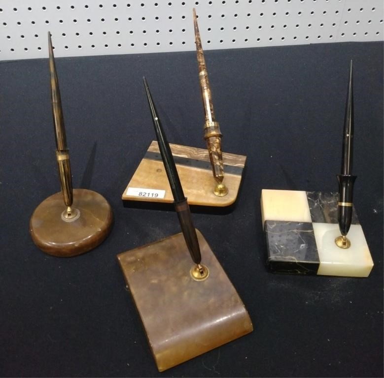 Appraisal: A group of four pen stands including Eversharp onyx with