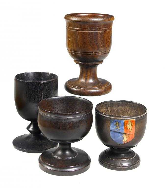 Appraisal: THREE TREEN TURNED GOBLETS AND ANOTHER POSSIBLY A MORTAR one