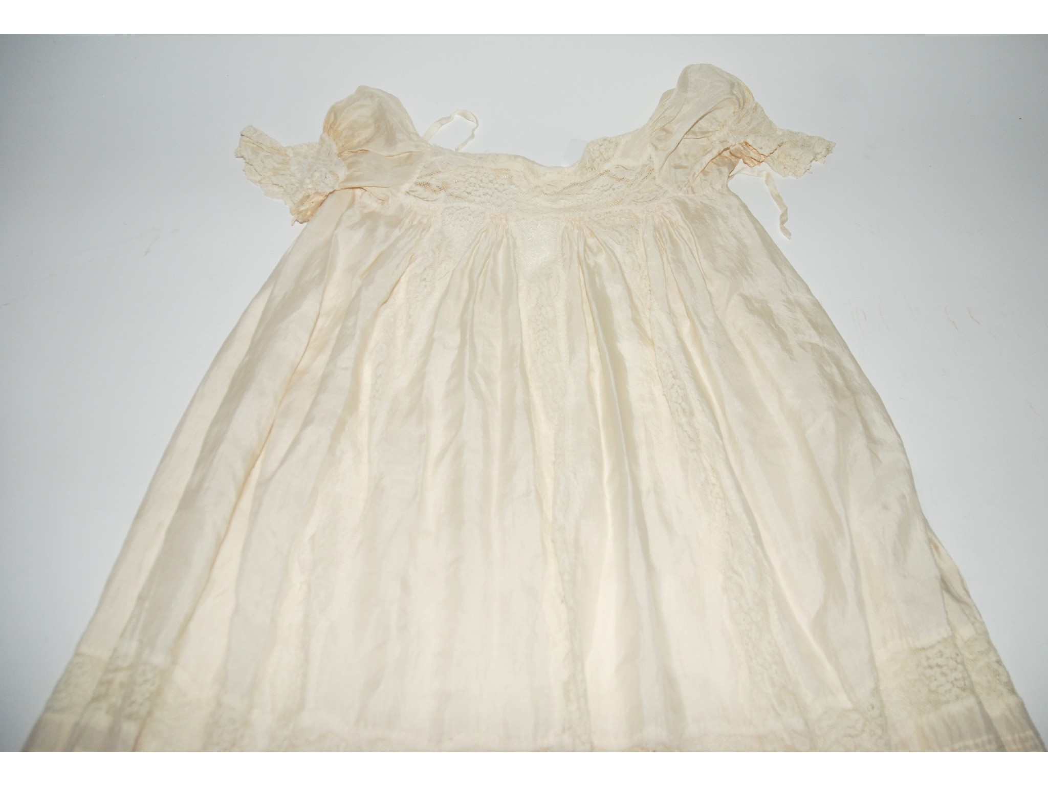 Appraisal: An early silk christening robe