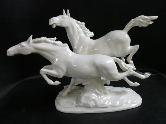 Appraisal: HUTSCHENREUTHER PORCELAIN WILDLIFE FIGURAL GROUP depicting two running horses by