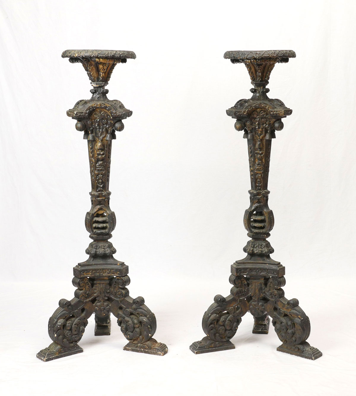 Appraisal: PAIR OF EARLY CARVED PAINTED PLANT STANDS carved pierced black