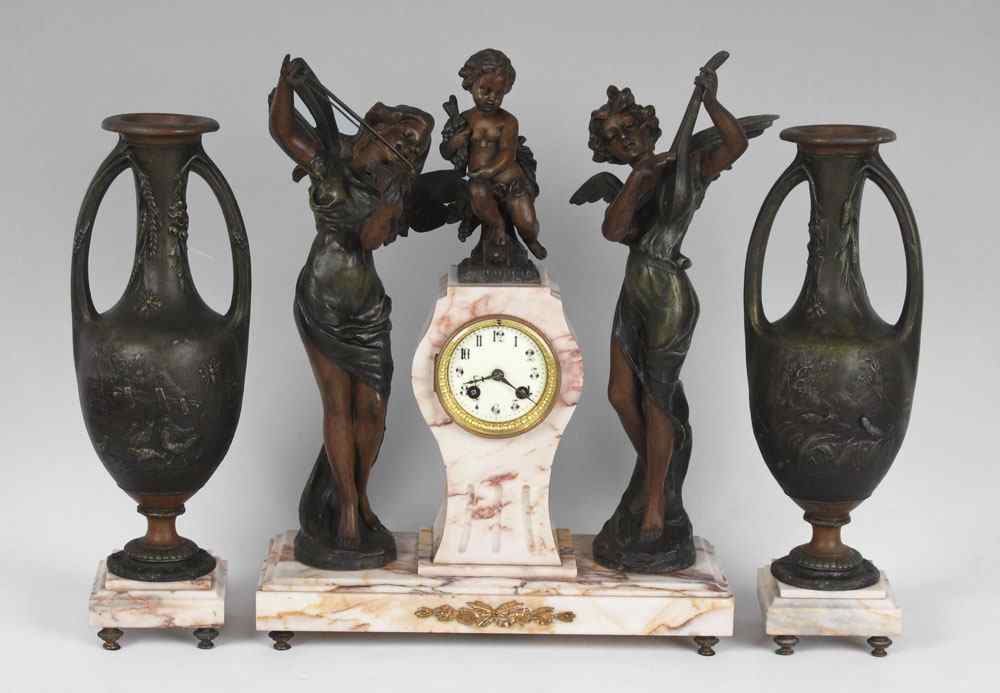 Appraisal: FRENCH FIGURAL MARBLE CLOCK GARNITURE SET Marble case surmounted with