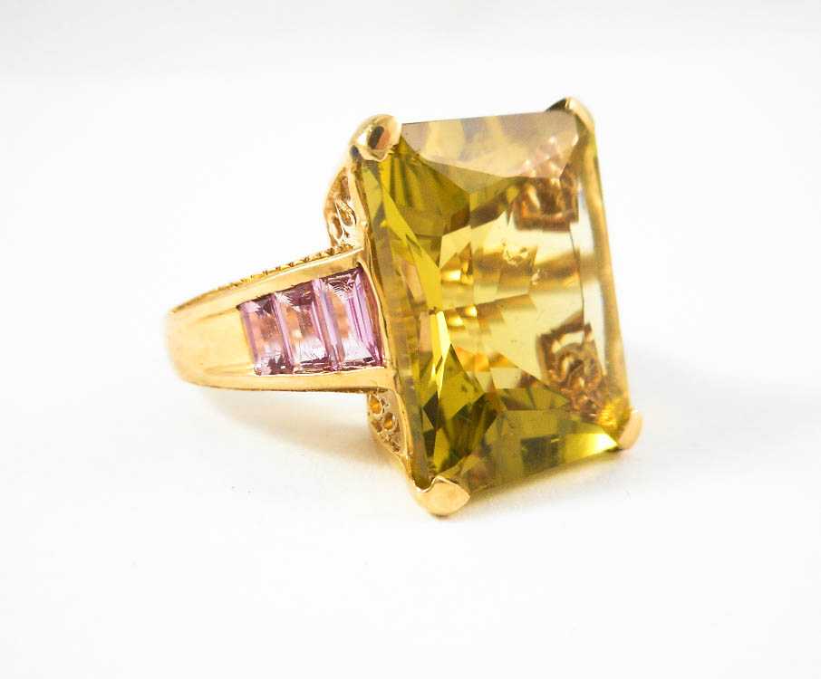 Appraisal: LEMON CITRINE AND PINK SAPPHIRE RING k yellow gold with