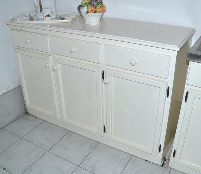 Appraisal: WHITE PAINTED THREE DOOR THREE DRAWER CABINET AND CONTENTS