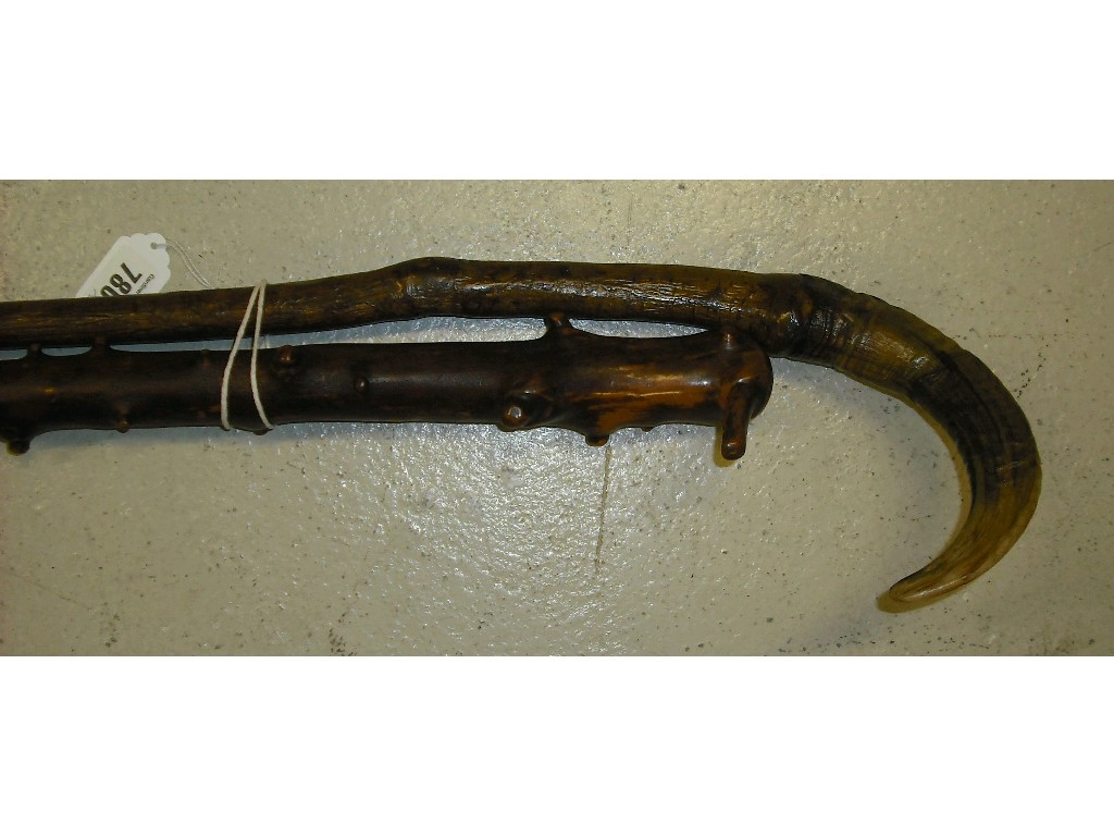 Appraisal: Sheep's horn mounted walking stick long together with a knopped