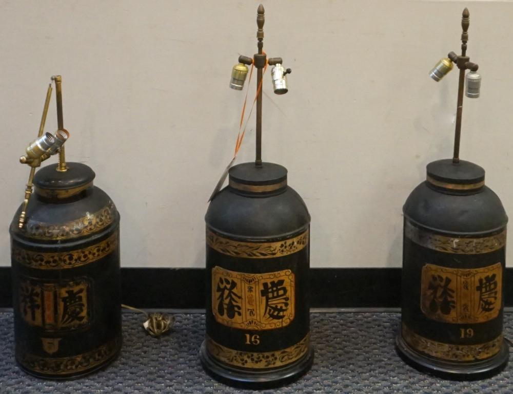 Appraisal: THREE EDWARDIAN PARTIAL GILT AND BLACK TOLE TEA CANISTERS MOUNTED