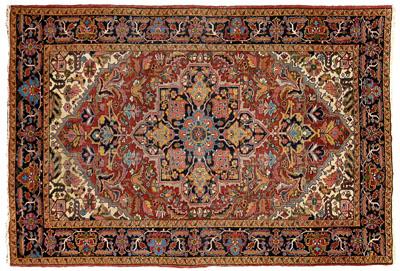 Appraisal: Karajeh or Heriz rug large blue central medallion on burgundy