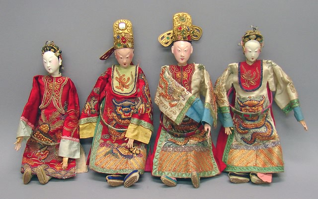 Appraisal: Lot of - Chinese theatre dolls Dressed in embroidered red