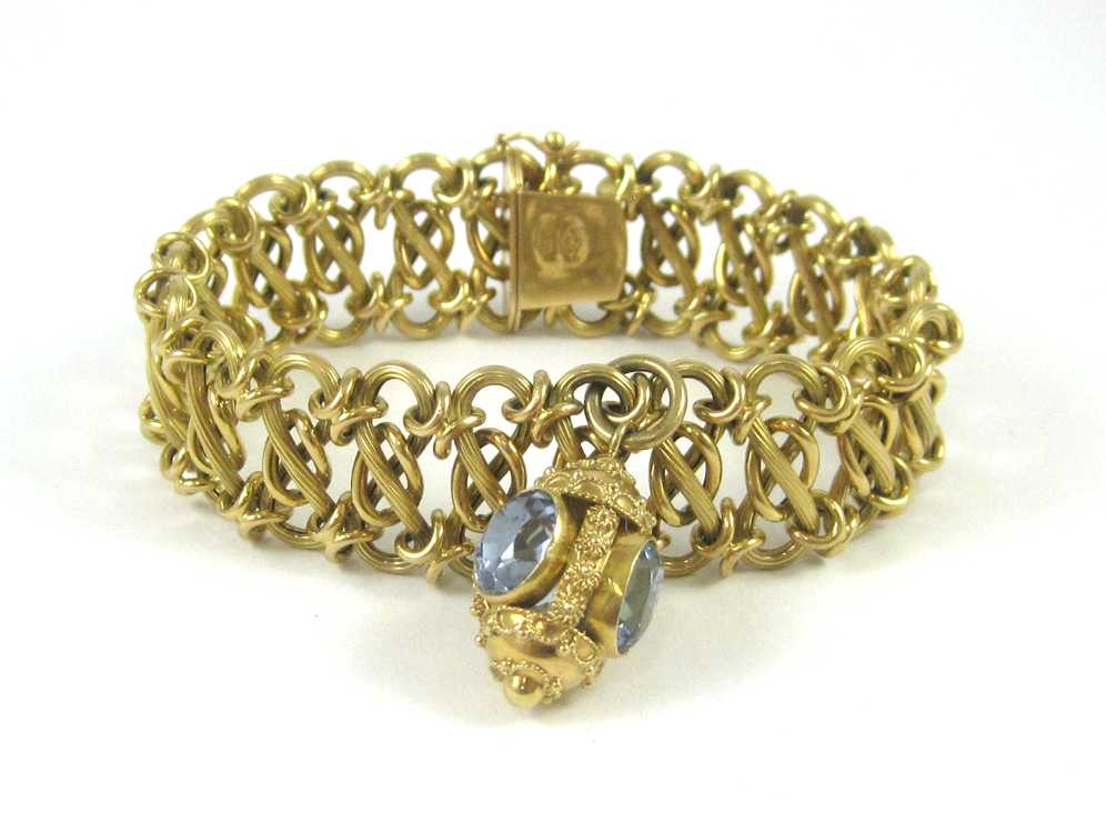 Appraisal: SPINEL AND EIGHTEEN KARAT GOLD BRACELET The heavy yellow gold