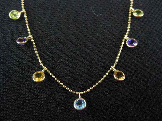 Appraisal: k Gold Gemstone Necklace amethyst peridot garnet citrine blue topaz