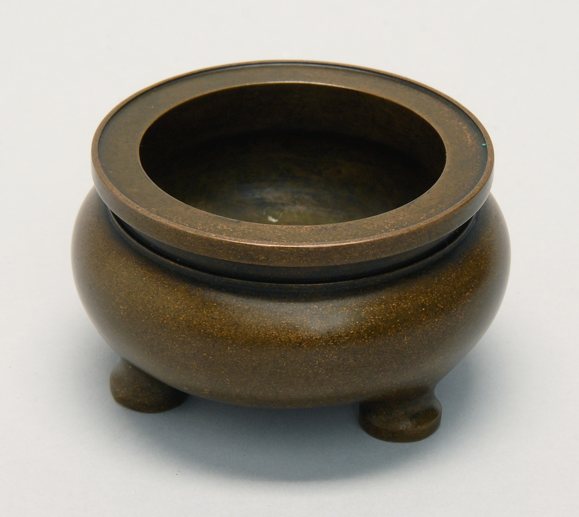 Appraisal: BRONZE TRI-FOOT CENSER In ovoid form with brown patina Three-character