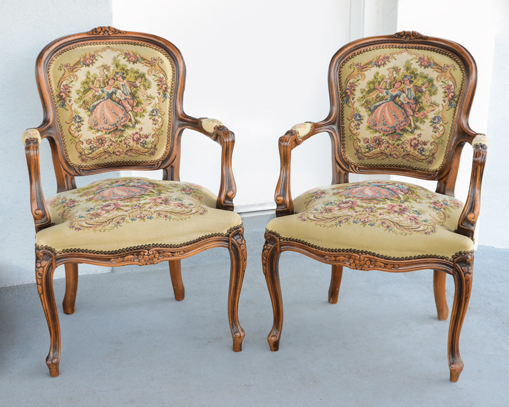 Appraisal: PAIR FRENCH STYLE FAUTEUIL ARM CHAIRS Carved and shaped walnut