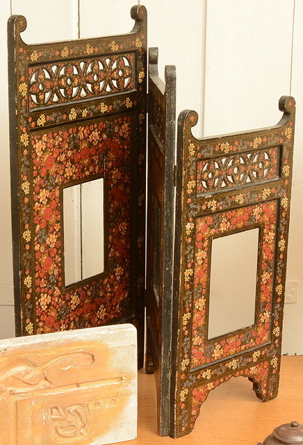 Appraisal: A KASHMIRI THREE FOLD LACQUERED TABLE SCREEN profusely decorated with