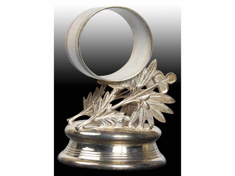 Appraisal: Leaves Fern Clover Figural Napkin Ring Description Round raised base