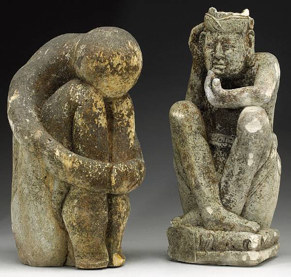 Appraisal: Two Southeast Asian carved stone figures The first depicted seated