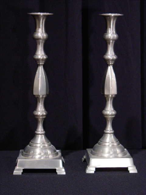 Appraisal: PAIR OF MODERN PEWTER-FINISHED CANDLESTICKS Pewter over brass h in