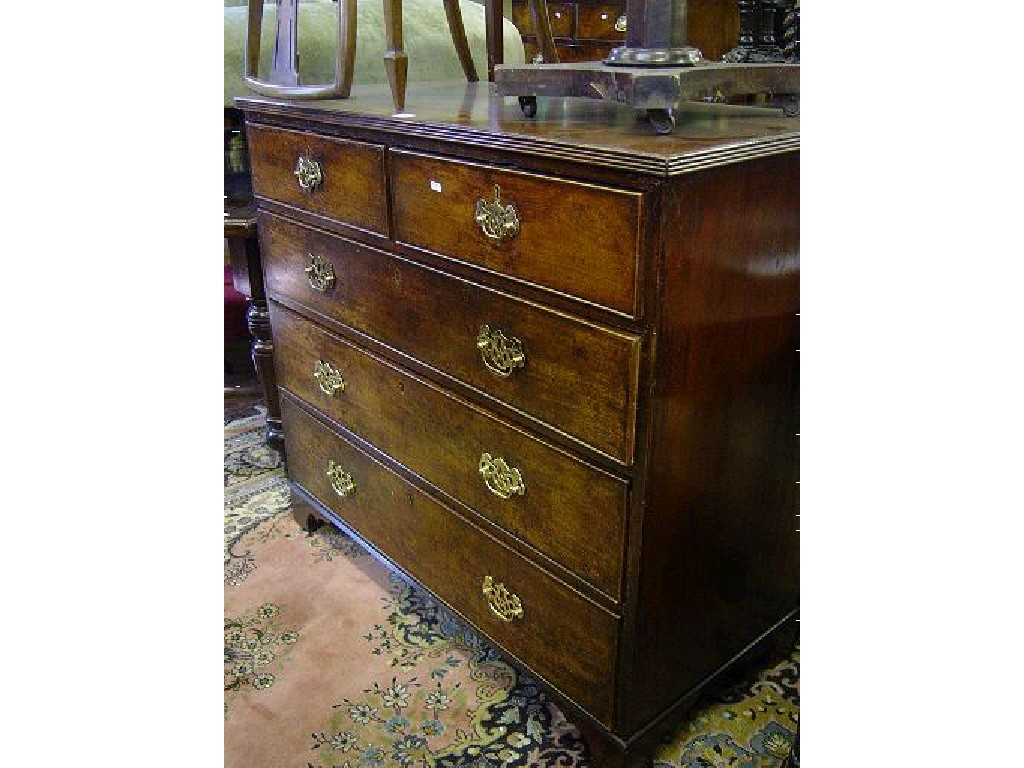 Appraisal: A Georgian mahogany chest fitted with three long and two