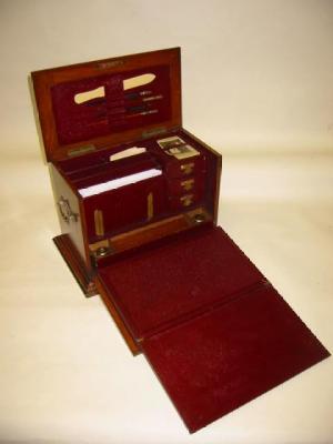 Appraisal: A VICTORIAN OAK PORTABLE STATIONERY DESK of oblong form with