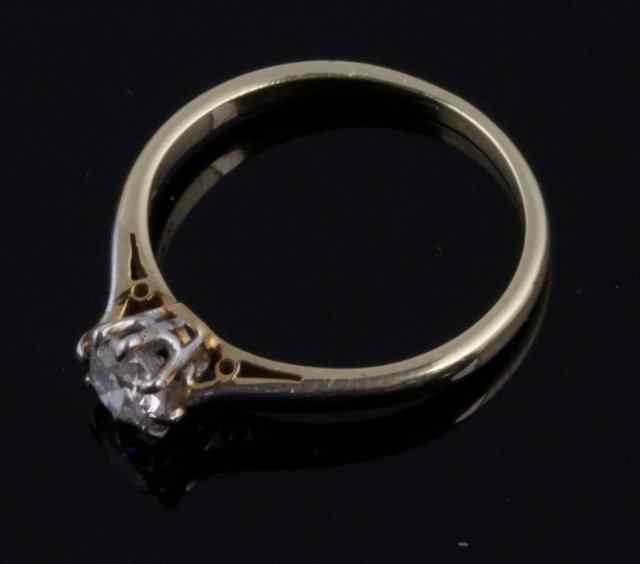 Appraisal: A diamond solitaire ring claw set on an ct gold