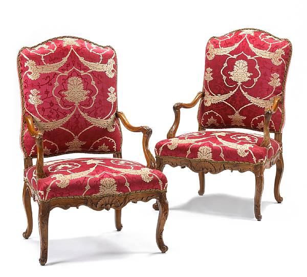 Appraisal: A pair of early Louis XV walnut fauteuils a la