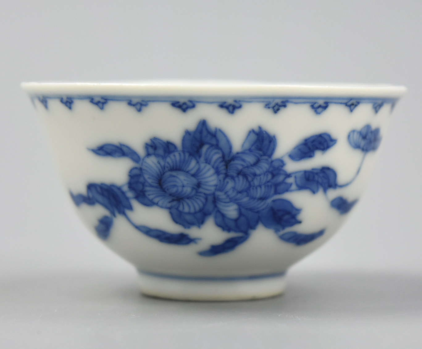 Appraisal: CHINESE SMALL B W PORCELAIN CUP KANGXI PERIOD A smal