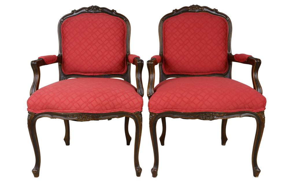 Appraisal: PAIR OF PROVINCIAL-STYLE FAUTEUILSred pattern upholstery with walnut frames Condition