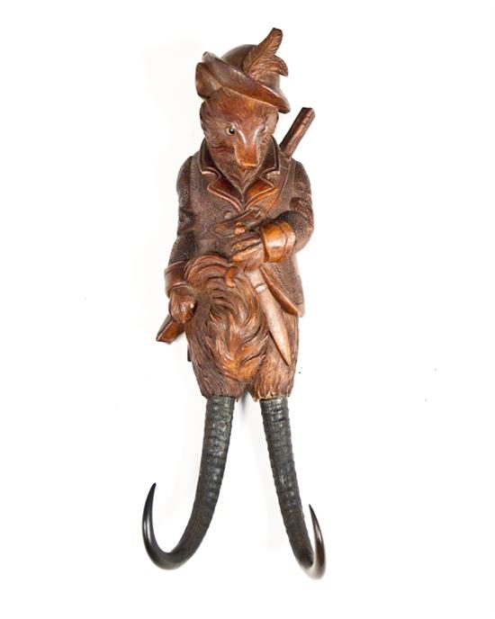 Appraisal: A th C Black Forest Figural Hat Rack with a