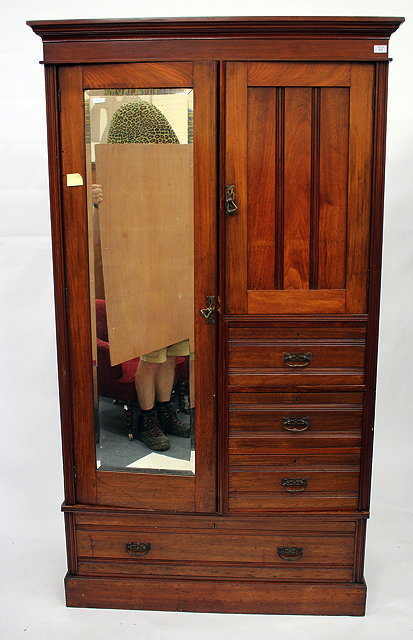 Appraisal: A VICTORIAN SINGLE WARDROBE the upper section with full length